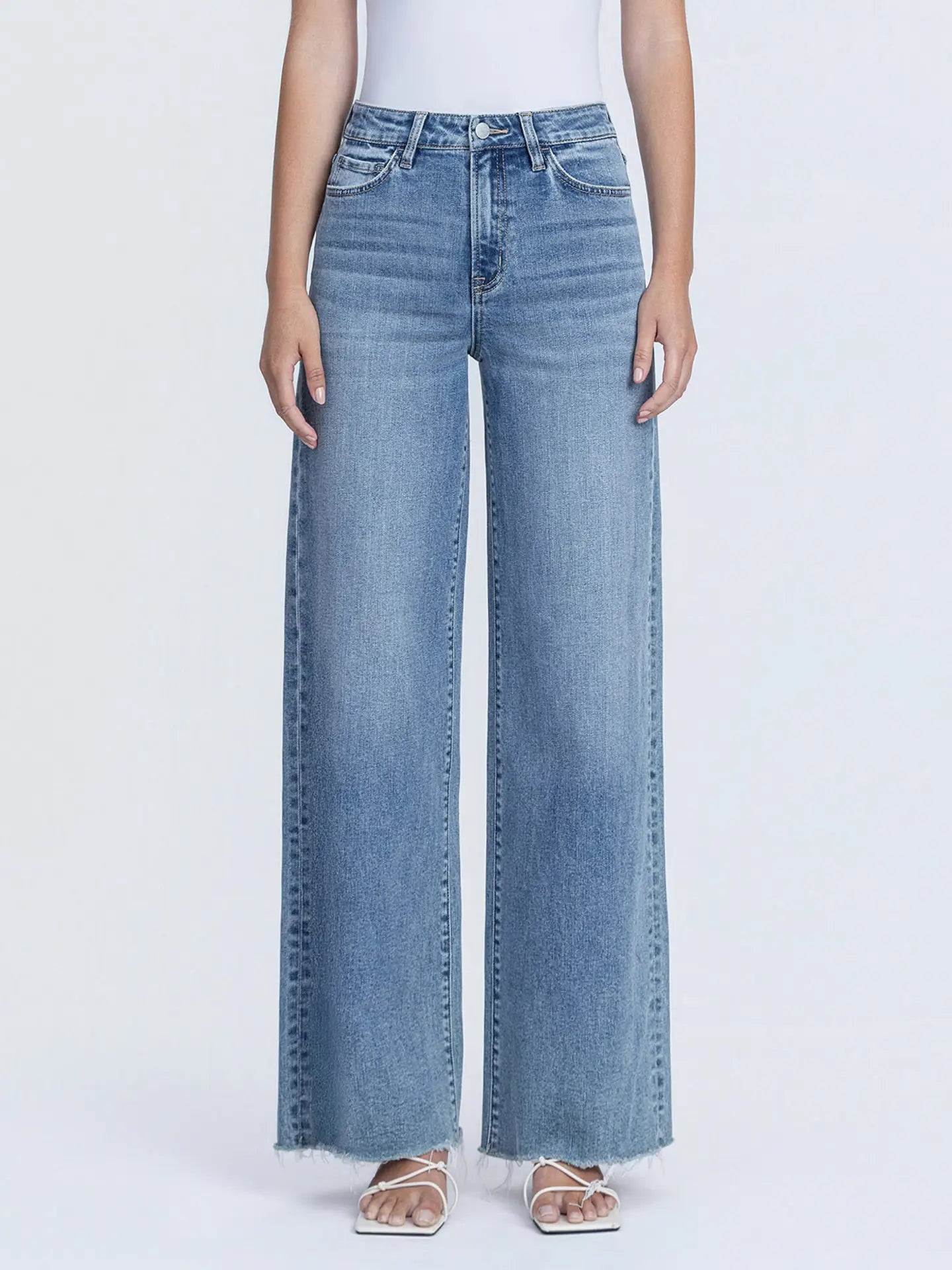 Sadie Super High Rise Medium Wash Raw Hem Wide Leg Jeans